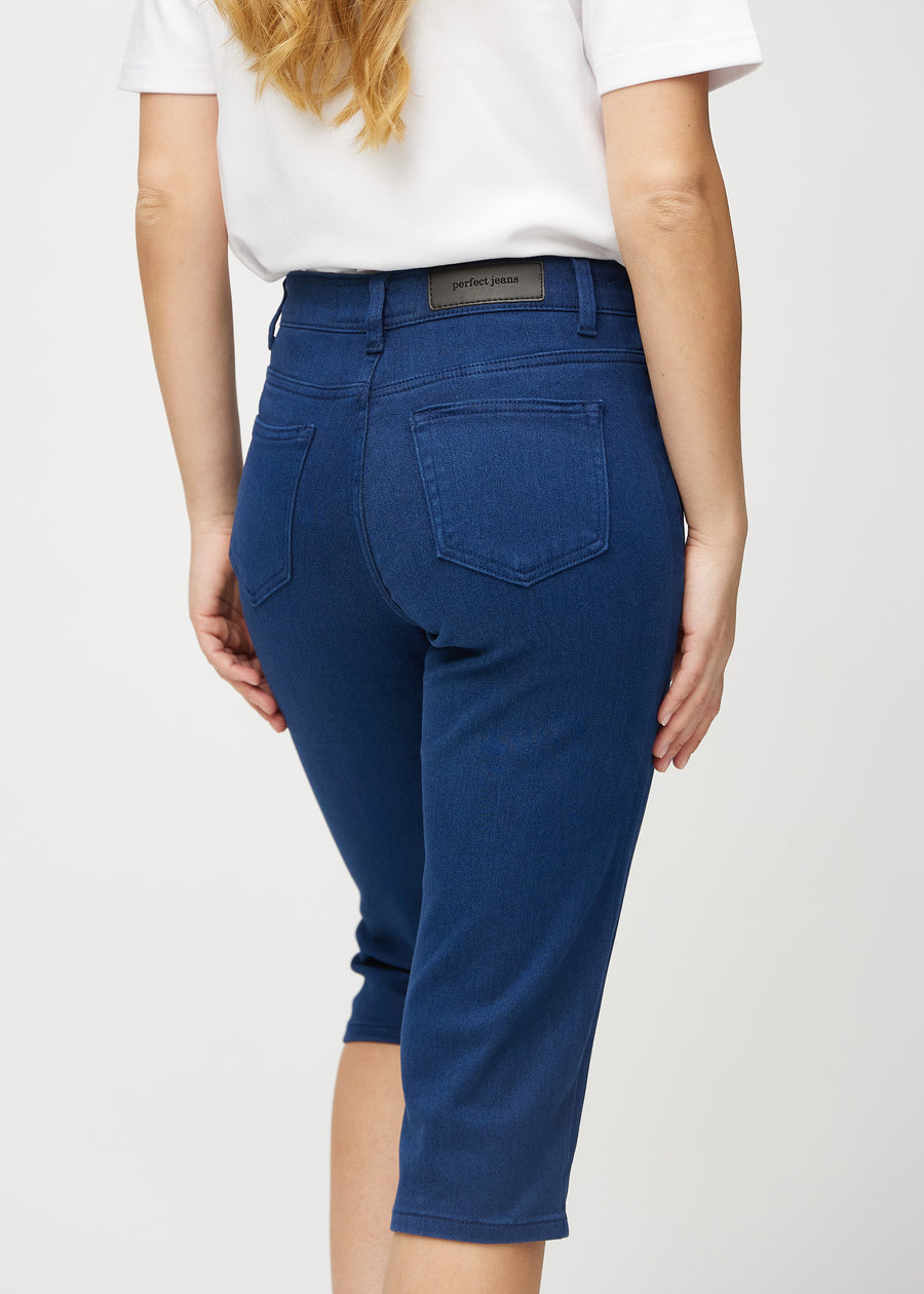 Dark blue regular capris seen from the back up close to show details.