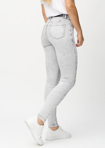 Light grey denim skinny jeans seen from the back, so the entire product can be seen.