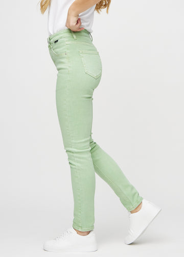 Slim jeans for women in light green, color Mints. Side view on a model.