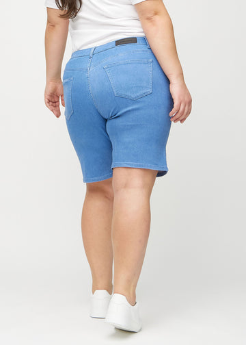 Blue regular middle shorts seen from the back on a plus-size model, so the entire product can be seen.