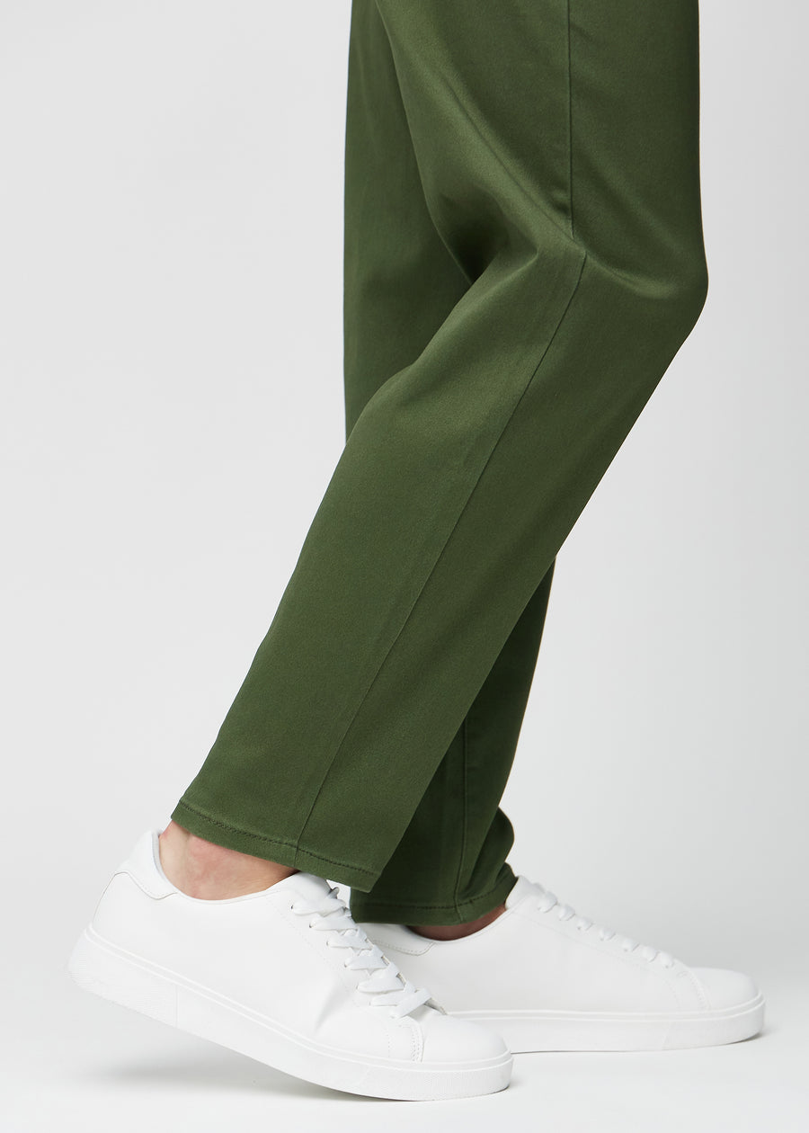 The ankles of a model, so you can see how loose the jeans fit.