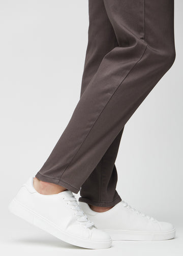 The ankles of a model, so you can see how loose the jeans fit.