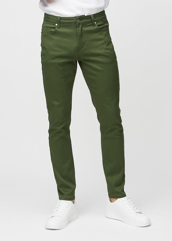 Dark green slim jeans, model name Renewals, fitted closely along the legs, front view.