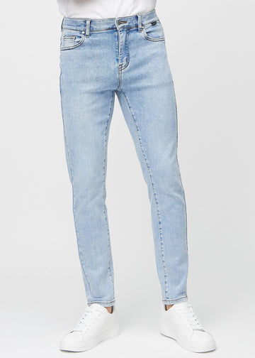 Light blue denim slim jeans, model name Waves, fitted closely along the legs , front view.